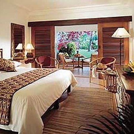 Ananda Beach Hotel Bali Exterior foto